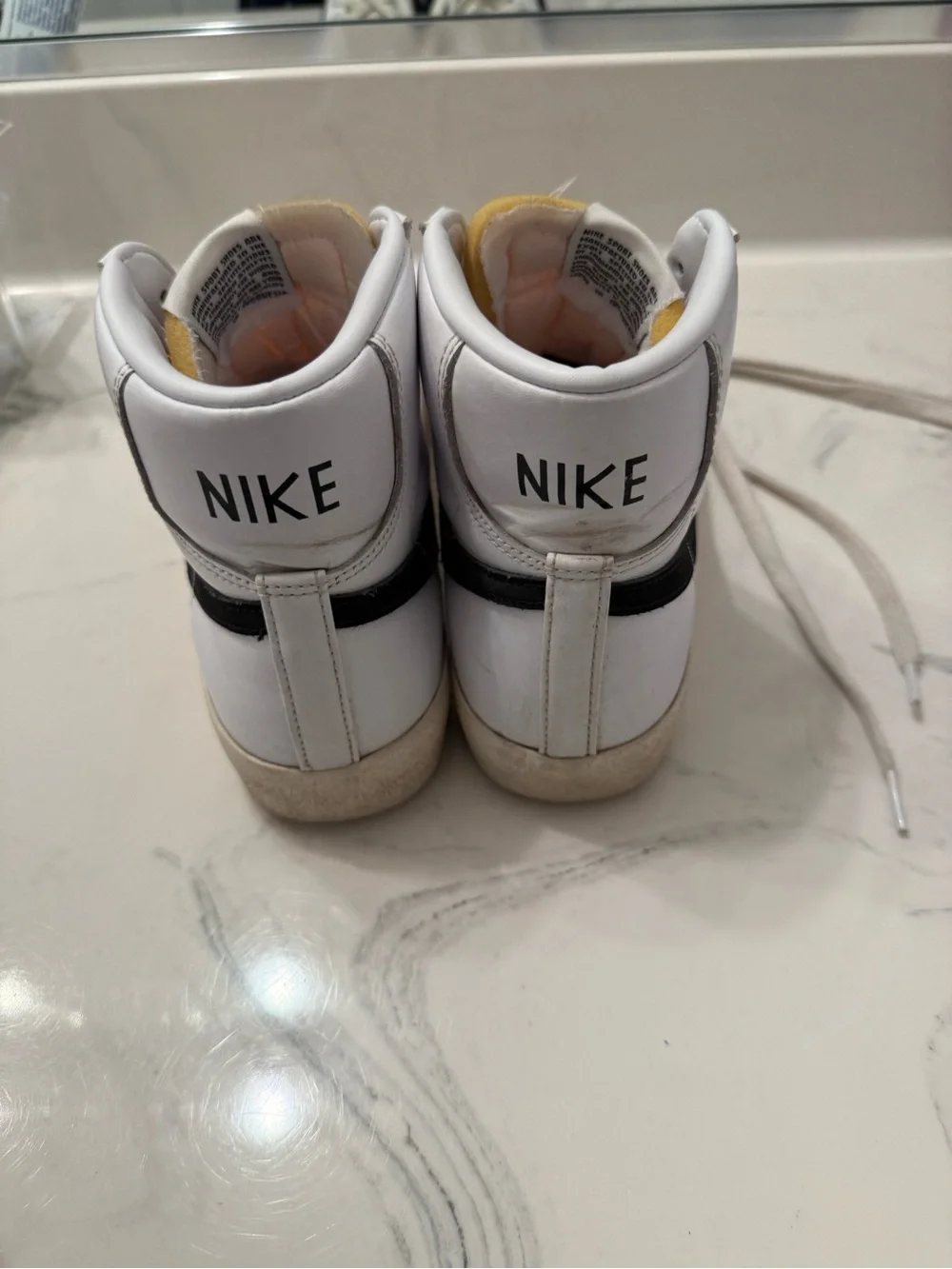 Nike Women’s White/Black High-Top Sneakers